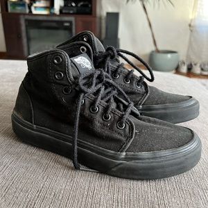 Black high top chukkas Vans